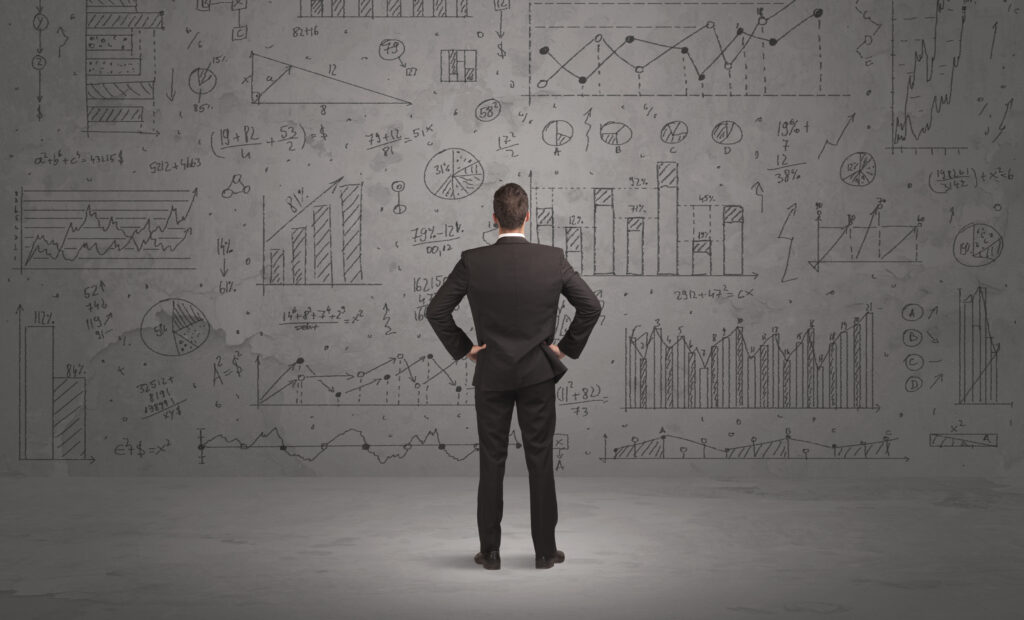 overfitting in trading - Zakenman kijkt naar grafieken en data.